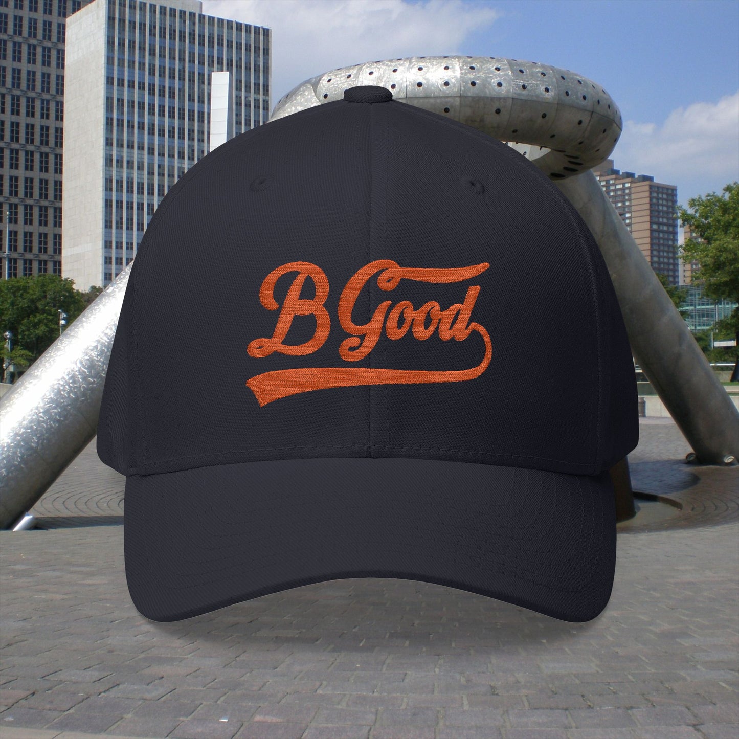 B. Good Fitted Embroidered Cap Orange Lettering