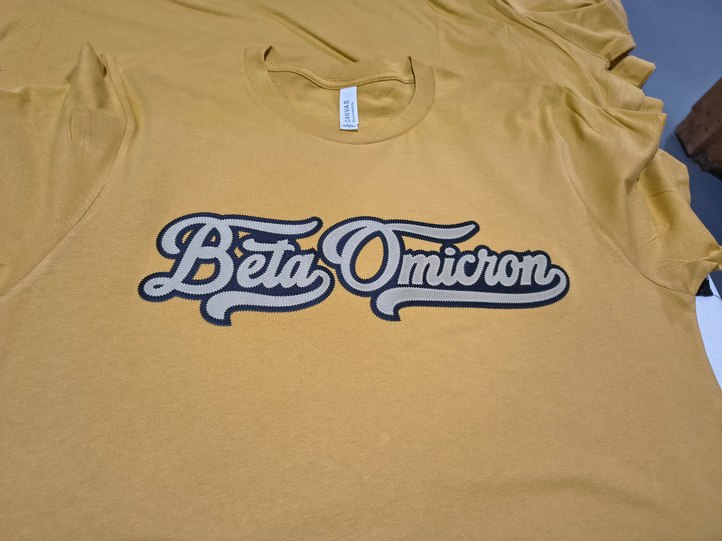Beta Omicron Script Lettering in Two Layered Sim-Stitch